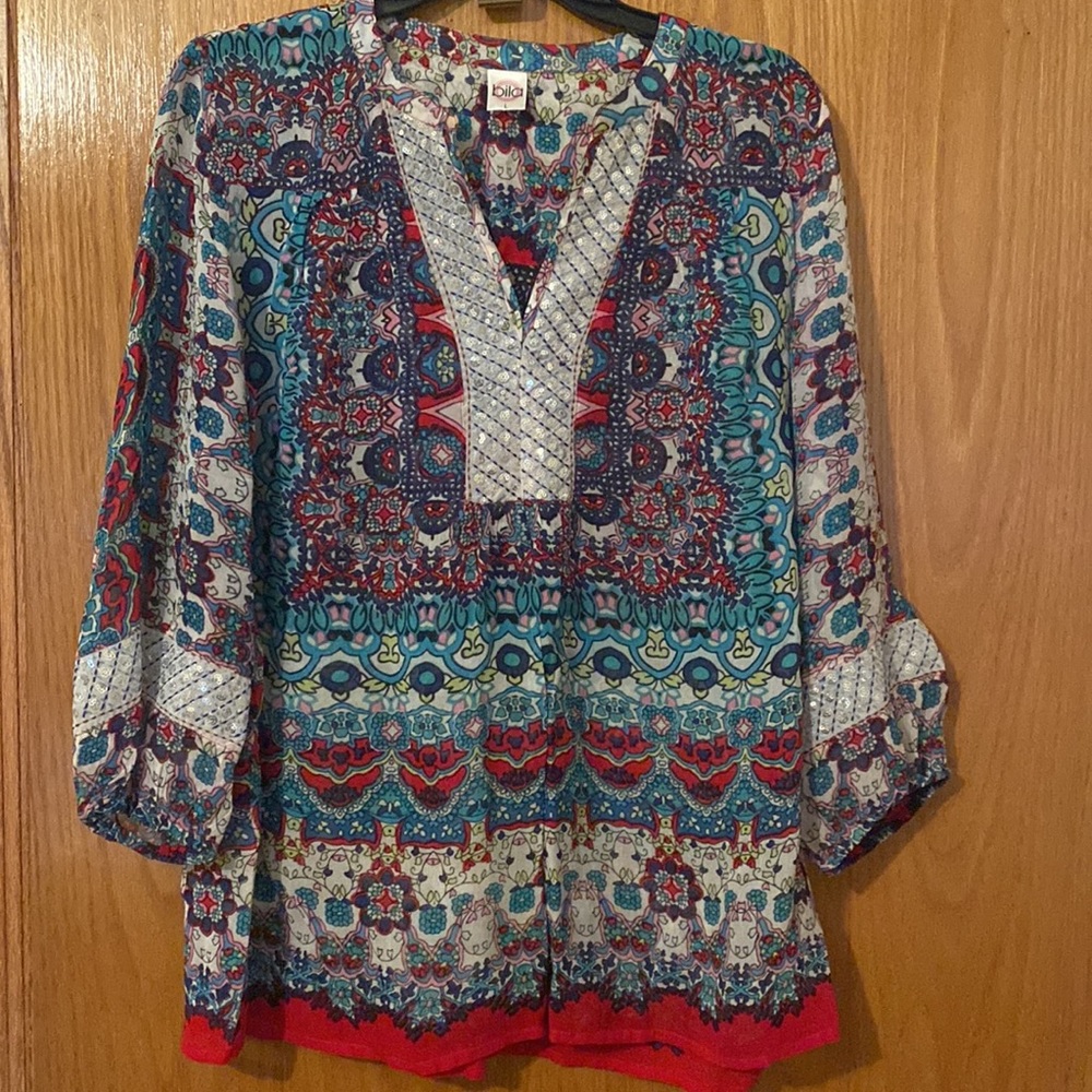 Boho style…Sheer long sleeve tunic with silver accenting on neckline & sleeves